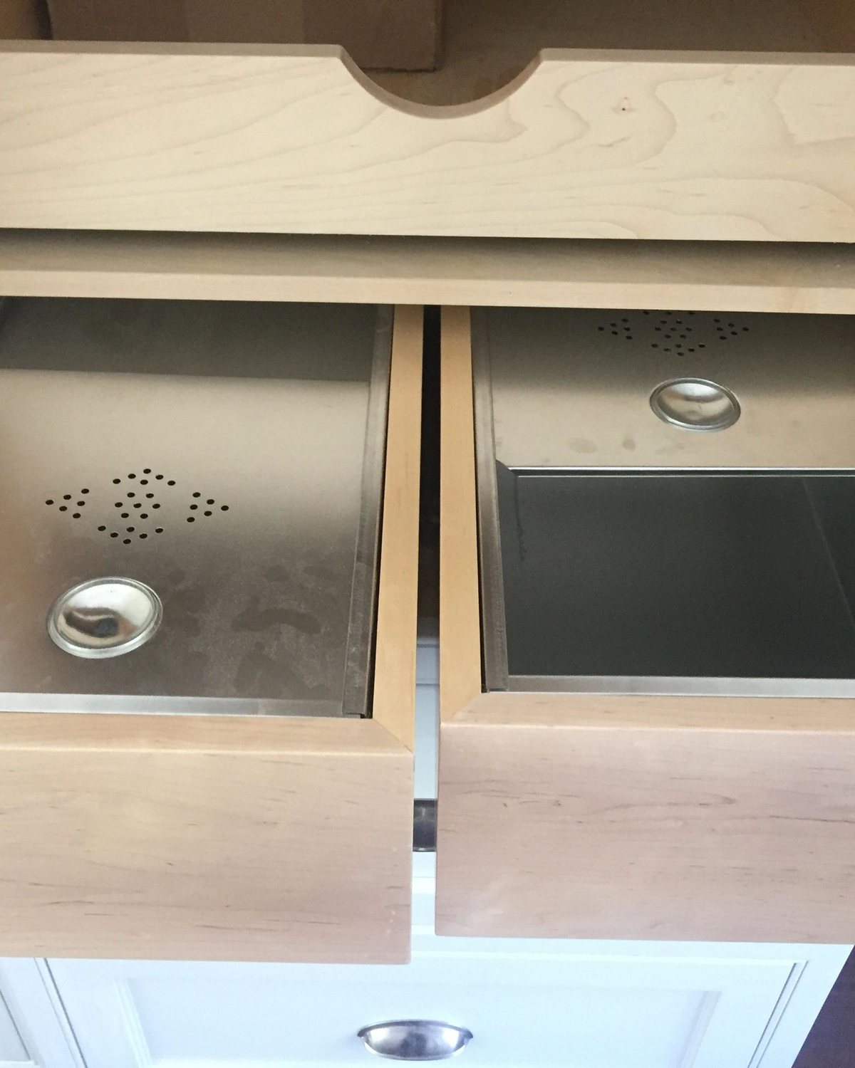 Twin pull out drawers fitted with stainless liners