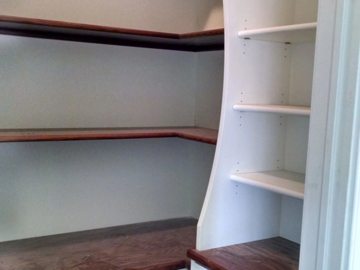 Fitted pantry shelving with wood edged shelves